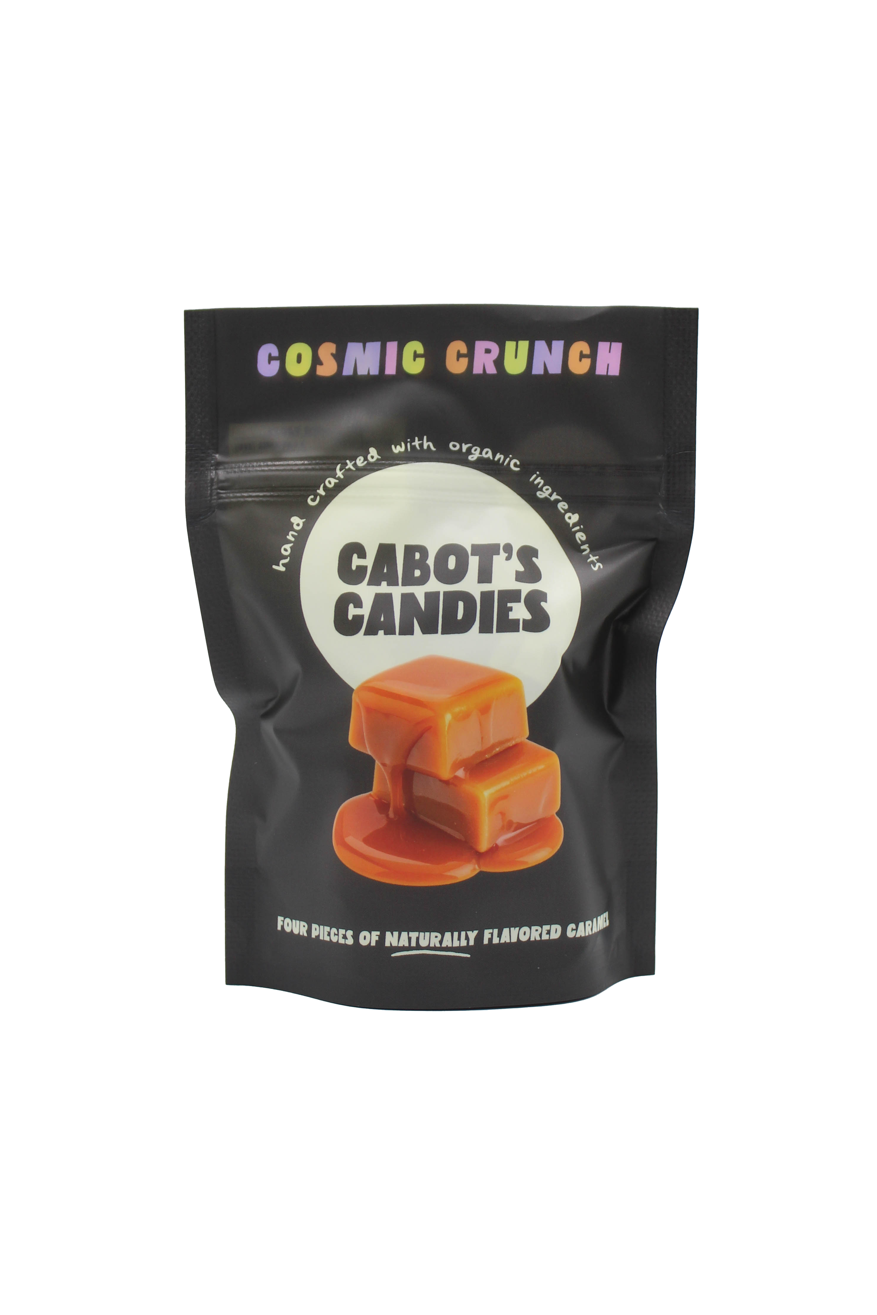 A black stand-up pouch of Cabot's Candies 'Cosmic Crunch' caramel candies, featuring a graphic of caramel squares on a white circle on the front, set against a plain white background.