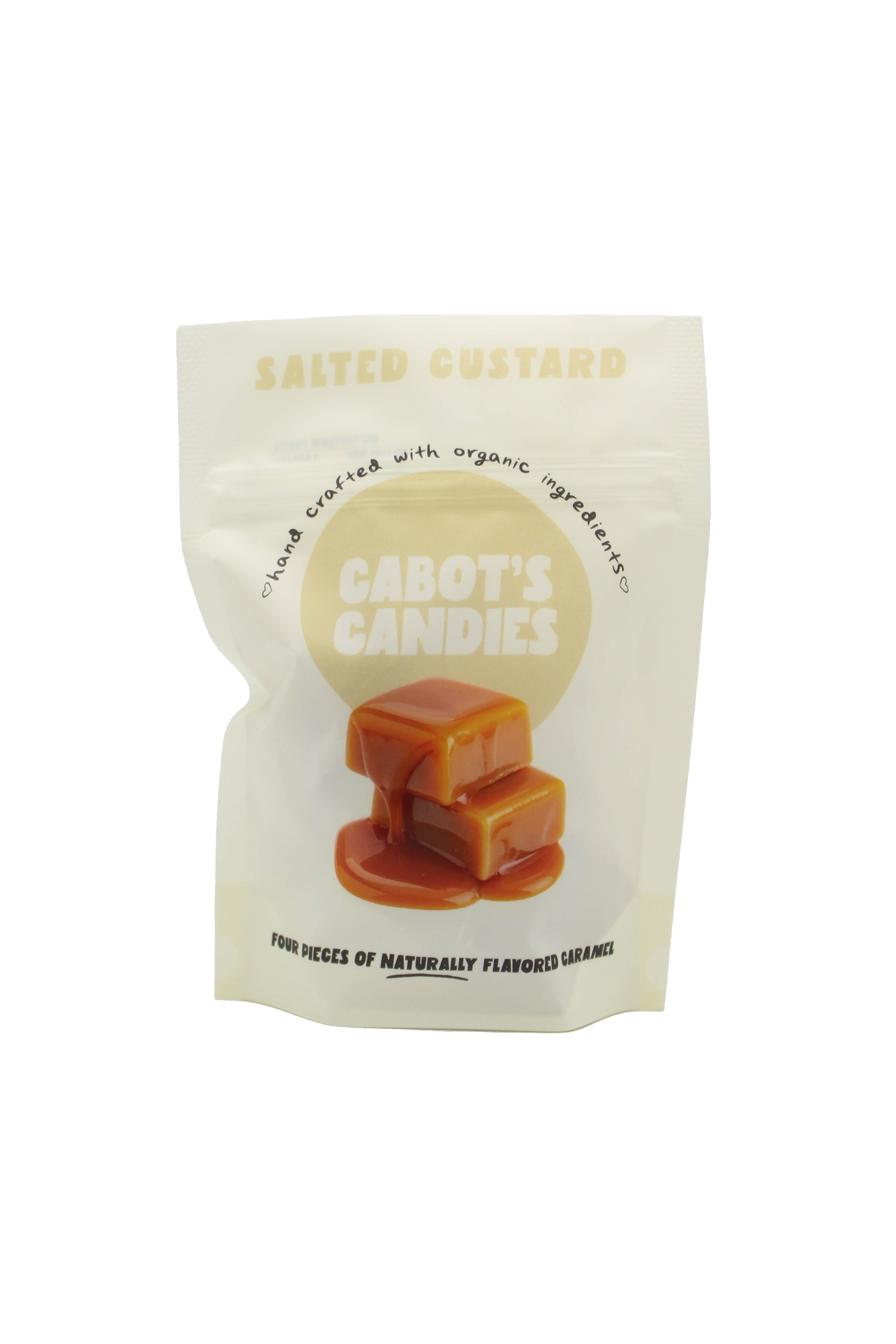 A stand-up pouch of Cabot's Candies Salted Custard caramel pieces, featuring a cream-colored background with a central tan circle and an illustration of two caramel squares.